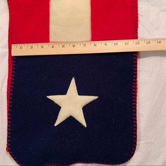 The flag scarf is cozy and soft to the touch. - Picture 4 of 13